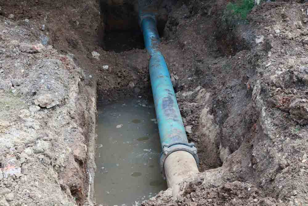 dug-up/exposed sewer line